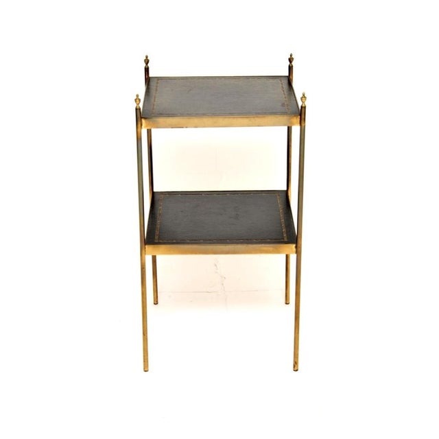 A smart and extremely well made vintage brass and leather side table. This was made in England, it dates from the 1960’s....
