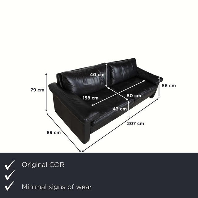 with this black COR Conseta sofa, you're bringing a true piece of design history into your home. Designed by Friedrich-...