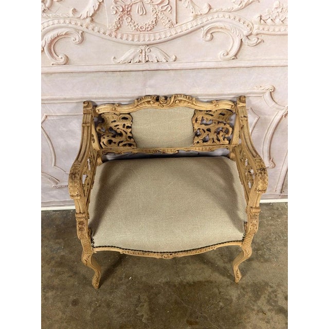 A rare and exquisite Venetian Rococo-style pierced settee, a true sculpture in wood, embodying the ethereal romance of...