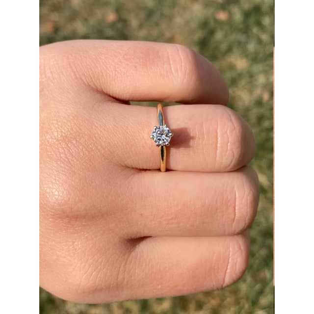 The Dulzura: Old European Cut Diamond Engagement Ring in Yellow Gold. The ring centers on a 0.42 carat European cut...