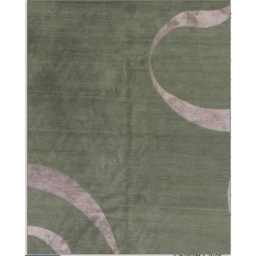 Nepalese Rug Collection of hand-knotted wool and silk rugs features a wide selection of visually alluring floor coverings...