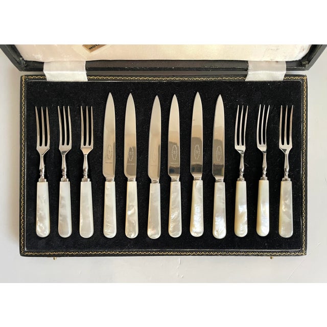 Here is a stunning set of TWELVE total pieces, six knives and 6 forks, made by George Butler & Co. in Sheffield, England...
