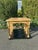 Fine ebonized burl wood side table in the neoclassical style. Eight fluted columns with hand-ebonized detailing gracefully...