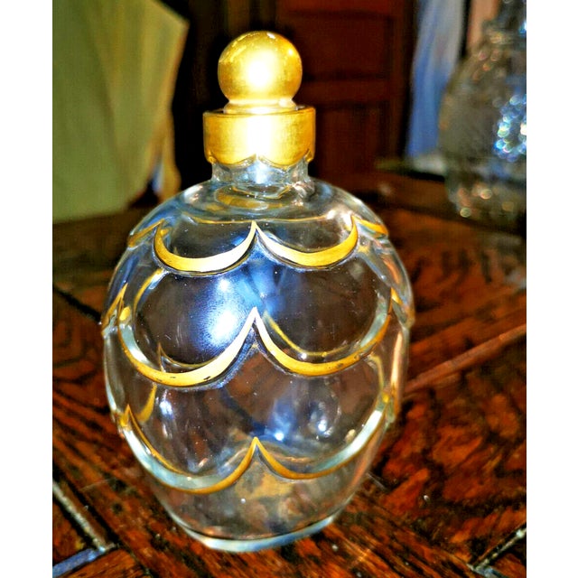 BACCARAT Manufacture - a design by Georges Chevalier. Extremely rare oval perfume bottle with a bulbous body, crafted from...