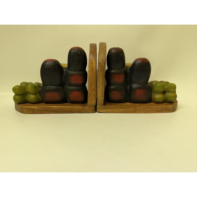 Enhance your bookshelves or vintage cookbook collection with this charming pair of mid-century modern fruit bookends....