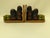 Enhance your bookshelves or vintage cookbook collection with this charming pair of mid-century modern fruit bookends....