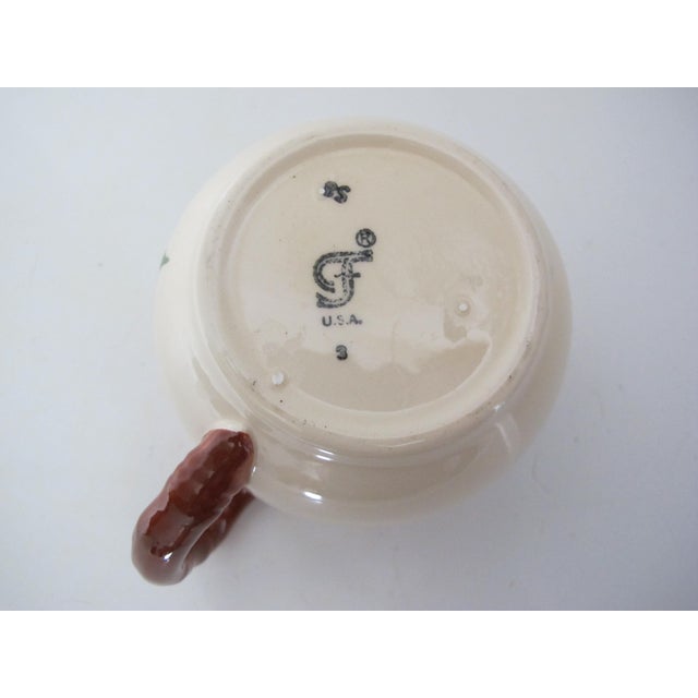 Nice Franciscan apple pattern mug. This has the flying f mark made from 1979 to 1984.