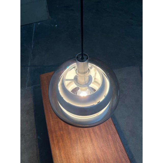 Imposing space age pendant lamp from the renowned manufacturer doria leuchten. a design made of glass and aluminum. A...