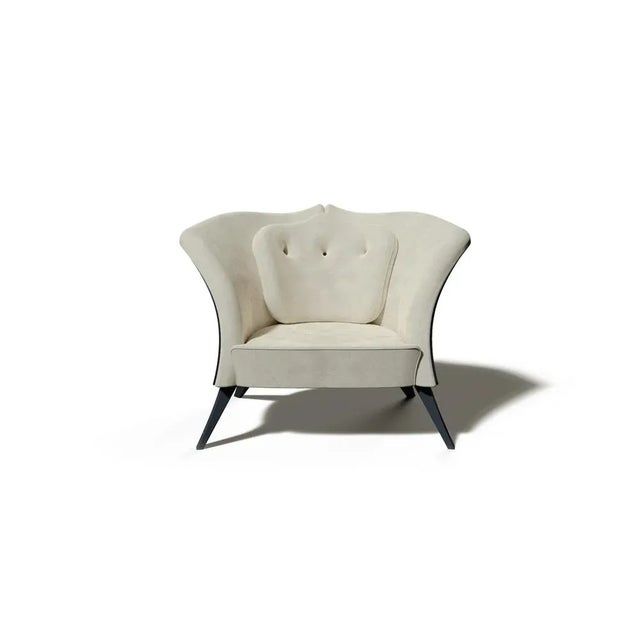 This fully upholstered armchair will add character and elegance to any contemporary style interior design due to its...