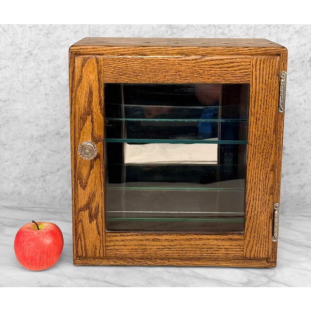 - Early 20th Century Apothecary Glass Front Cabinet - Solid Oak with a Wonderful Grain Throughout - Mirrored Back Interior...