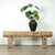 Handcrafted from massive solid log elmwood, this substantial 100-inch vintage console table brings rich architectural...