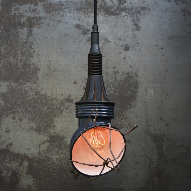 Blue enamel work light, 2 meter black cotton wire and plug. Up to 250V (Europe/UK Standard).The wiring of this item may be...