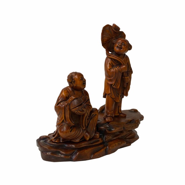 This is a handmade Chinese accent decorative figure made of wood and carved with oriental mythical Golden Kids theme....