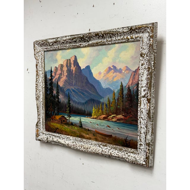 Design Plus Gallery presents a Kintla Lake Oil Painting by Harry Leonard Lopp. This oil painting depicts a mountain lake...