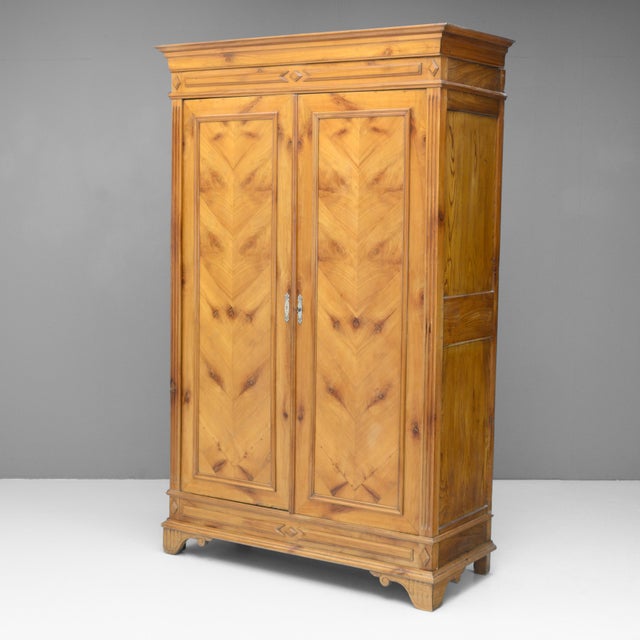 Two door French armoire in elm. Circa 1890.
