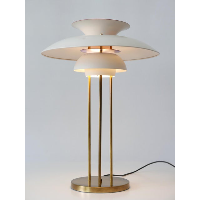 Rare and elegant mid-century modern table lamp 'ph 5'. Designed by poul henningsen in 1958. Manufactured by louis poulsen,...