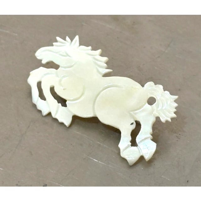 1960s-70s mother of pearl carved horse brooch. Excellent condition.