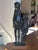 This striking, mid-century modern bronze sculpture features an stylized depiction of a mother and child standing side by...
