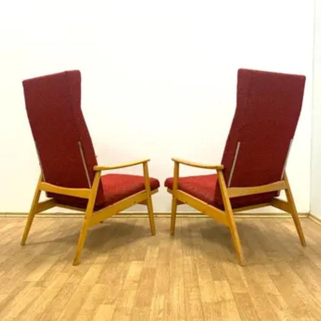 A pair of stylish and timeless retro armchairs produced by ton in czechoslovakia during the 1960s. These iconic pieces...