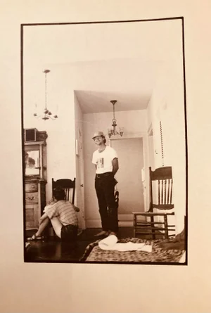 1960s Black and White Photo of People in an Interior