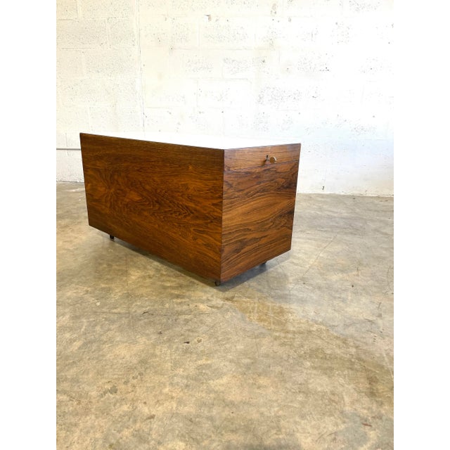 Rare dry bar table on wheels designed by Poul Norreklit and manufactured by Dyrlund, Denmark 1960. Top slides and reveals...