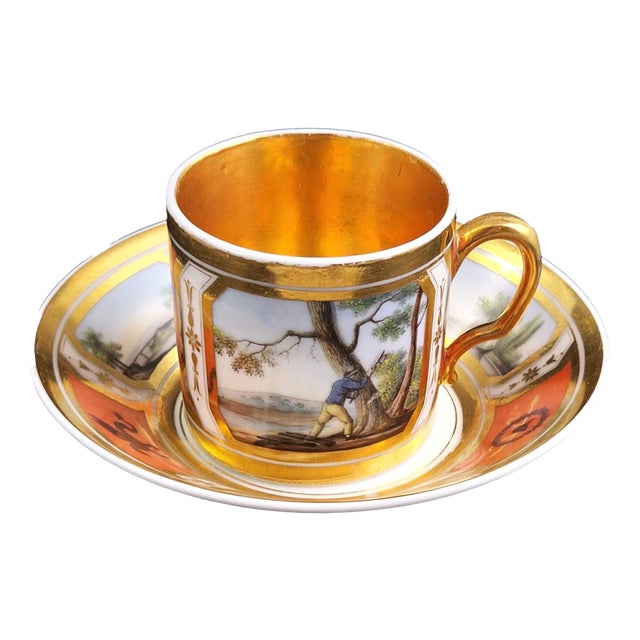 French Paris Porcelain Cup and Saucer with Pastoral Landscapes and Martial Emblems, 1820, Set of 2 For Sale