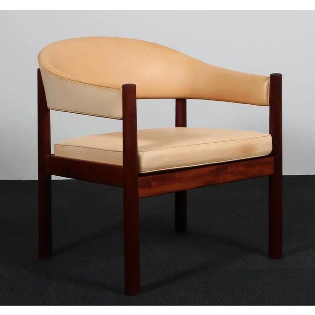 Grete Jalk, unique lounge chair in mahogany Original upholsteret with light patinated nature leather. Made by Niels Risom....