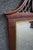 Henkel Harris Chippendale-style mahogany wall mirror, Model H-12, crafted in 2000. The mirror features an elaborate carved...