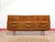 A beautiful credenza by renowned British furniture maker Sutcliffe, this Mid Century Modern Vintage Teak Tall Credenza...