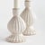 Made of a highfired, durable stoneware, a ribbed pattern and finished with a dynamic reactive glaze, these candle stands...