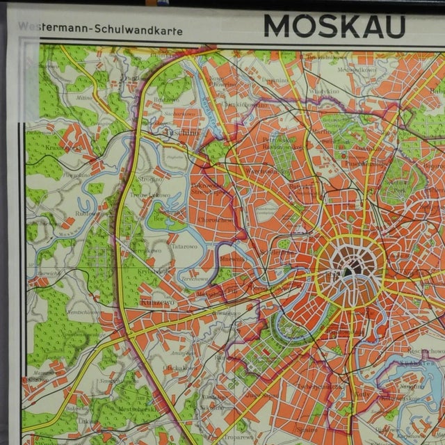 A classical rollabe vintage wall chart showing an aerial view of the city of Moscow, Russia. published by Westermann. used...