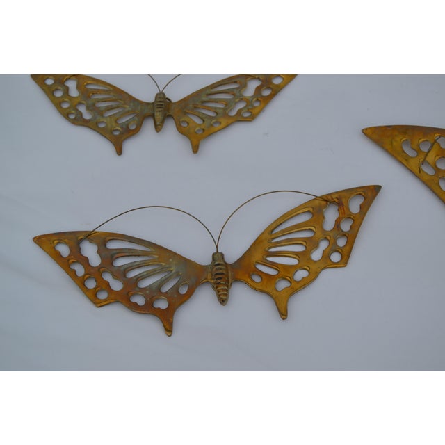 Set of three solid brass butterfly wall hanging decorations. Circa 1960s or 1970s. New in box. Made in Korea. Includes...