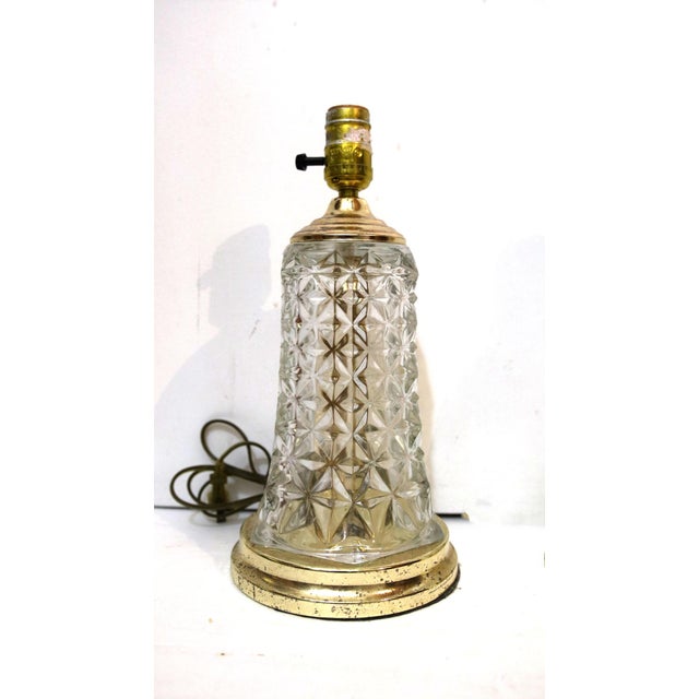 This is the most charming pair of diamond cut crystal lamps with deep facets that reflect the available light. I found...