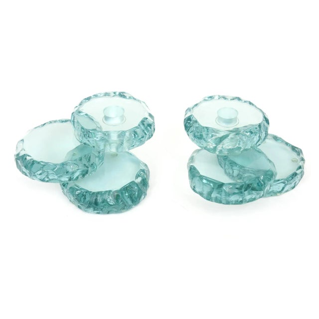 These lovely pair of studio artist signed light sea green glass tiered stacked candlesticks are from 1993. They are signed...