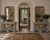 Elegant and theatrical, this pair of Neoclassical Empire console tables captures the enduring appeal of French Empire...