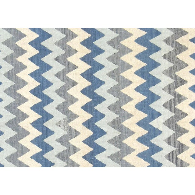 Contemporary Egyptian Kilim. Hand woven in modern designs with wool on cotton foundation in the Fustat region of the Nile...