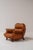 E. Cobianchi leather one-seater sofa, a beautifully sculptural piece that reflects the soft, generous forms typical of...