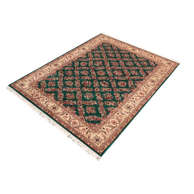 Designed with mesmerizing intricacy and gorgeous color palette, this hand-knotted masterpiece demonstrates the beauty and...