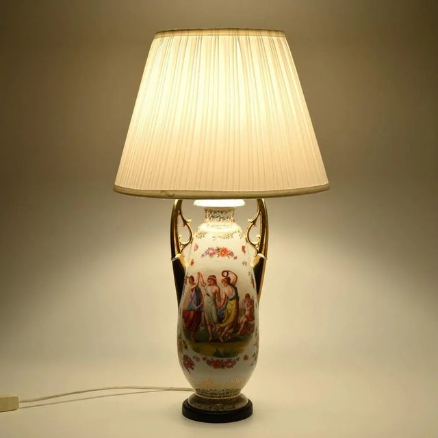 Table lamp made of antique porcelain vase from Austrian company of Ackerman & Fritze. Base is made of wood. Dimensions...