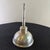 A striking blend of luxury and mechanical nostalgia, this midcentury sterling silver vermouth dropper by Tiffany & Co....