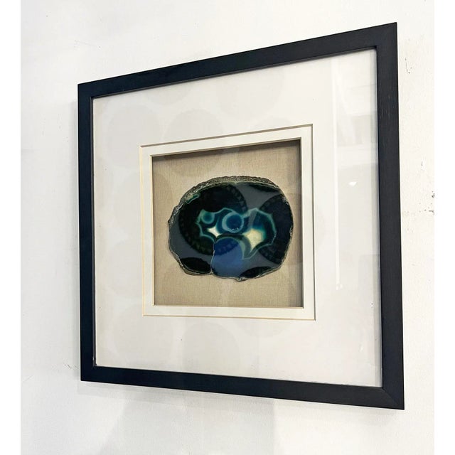 Beautifully framed sliced Agate stone displayed in quality sturdy box matted frame. Agate is historically known as the...