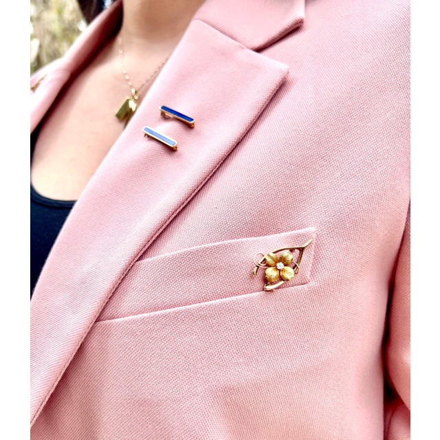 About This Pin: This stunning antique wishbone and clover brooch features an old European diamond set in the center,...