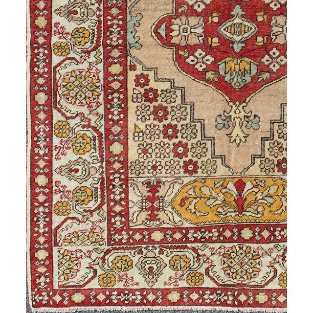 Keivan Woven Arts, Osm-04, 1930s Vintage Floral Turkish Oushak Rug - 4′4″ × 6′. This Turkish Oushak rug features a...