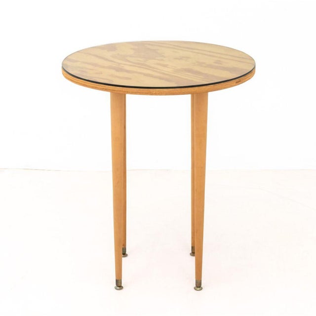 McCobb Style Circular Mahogany Side Table, with clear glass top on four tapered legs with brass feet. 29" H x 24"...