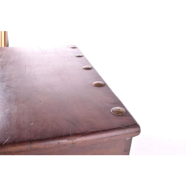 Large antique trunk with brass and sucupira binding from the 19th century, with iron carrying handles on the sides and a...