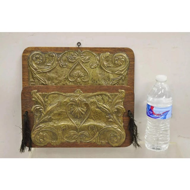 Antique Arts & Crafts Oak & Brass Embossed Folding Wall Hanging Letter Holder. Circa Mid 20th Century. Measurements: 10.5"...