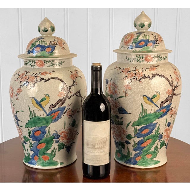 Chinoiserie Vintage 16" Chinese Chinoiserie Porcelain Cherry Blossom & Bird Urn - A Pair For Sale - Image 3 of 11