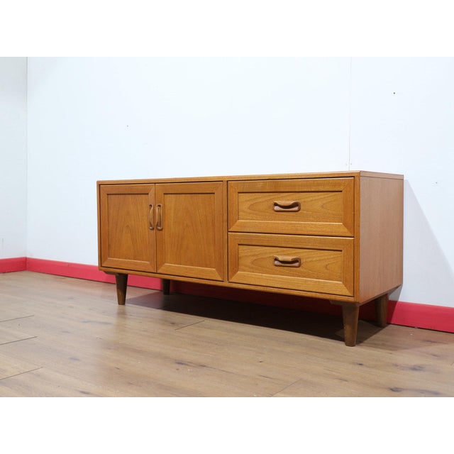 This Mid Century Modern Vintage Teak Media Cabinet Credenza by G Plan Danish Style is a beautiful teak low credenza,...