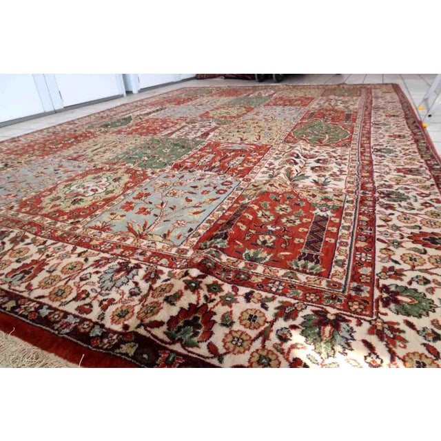 Vintage Indian rug with Qum garden design. This rug is from the end of 20th century in original good condition....