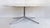 Florence Knoll Oval Carrara Marble Dining Table, Signed Stainless Steel Base Offered for sale is a Florence Knoll...